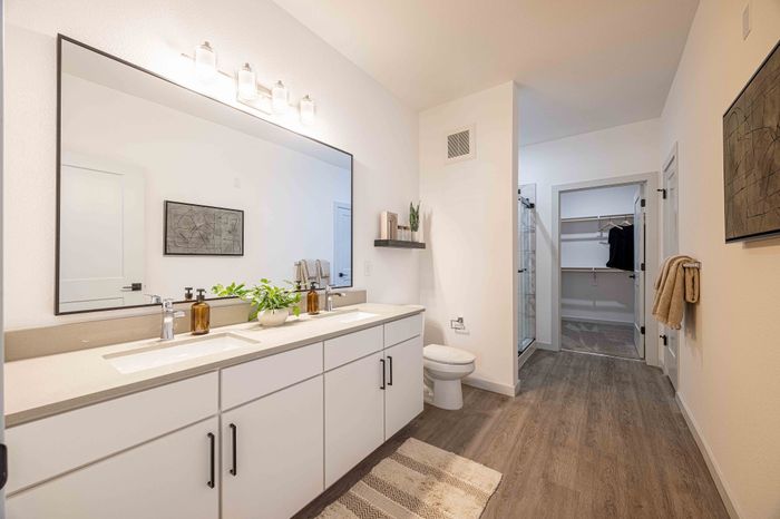 Double sink vanity in the Garrett Parker B1 floor plan primary bathroom