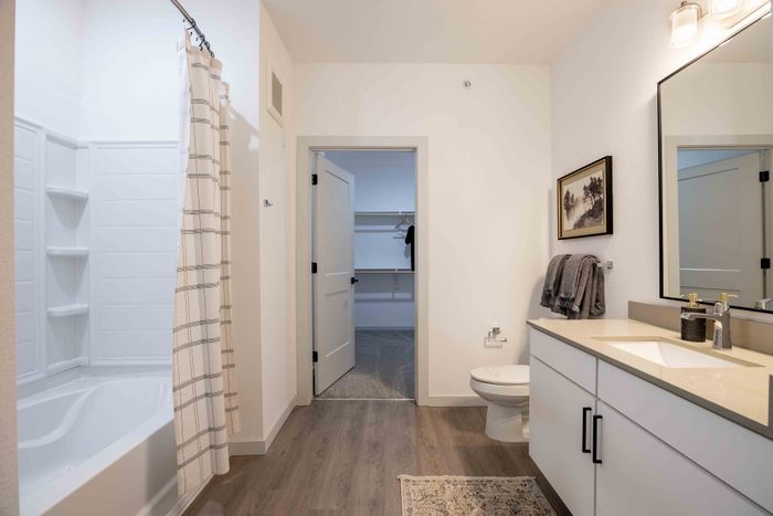Secondary bathroom with tub shower combo in the Garrett Parker B1 floor plan