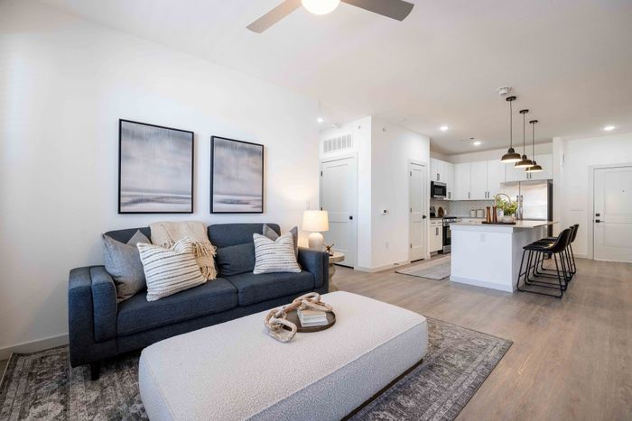 Living room with view into kitchen in the Garrett Parker B1 floor plan