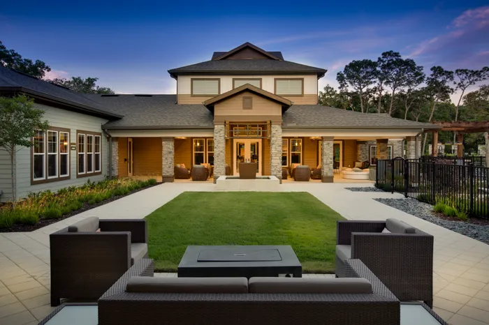 Photo of outdoor lounge seating and fountain.