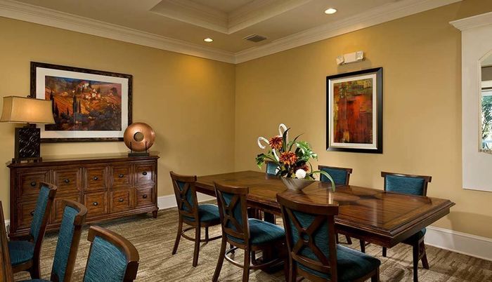 Elegant dining room with decor Sandalwood Village | Naples FL