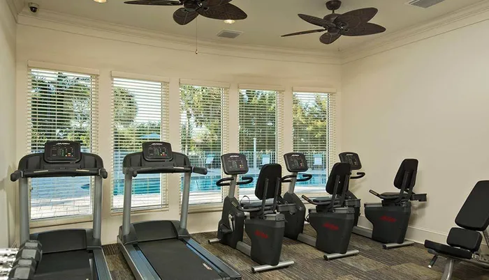 Exercise room with machines Sandalwood Village | Naples FL