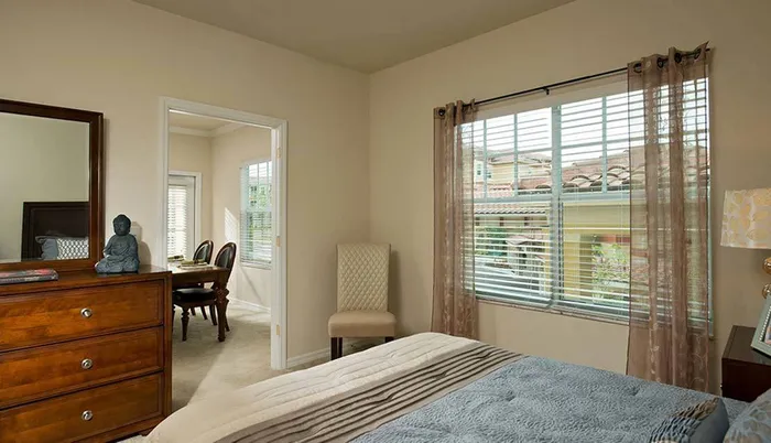 Bedroom with window view Sandalwood Village | Naples FL
