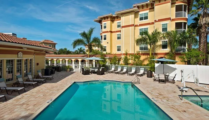 Swimming pool with clubhouse Sandalwood Village | Naples FL