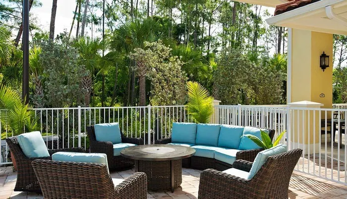 Cozy outdoor lounge area Sandalwood Village | Naples FL