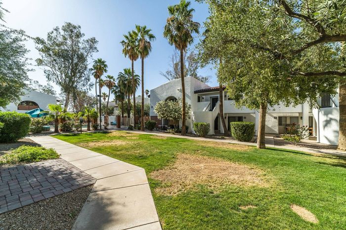 The Avenida Outer view of the apartments and grounds