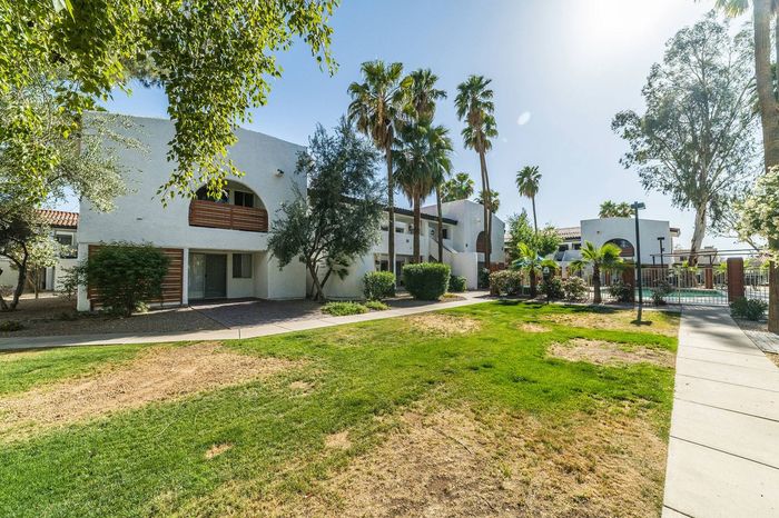The Avenida Exterior view of apartment and grounds
