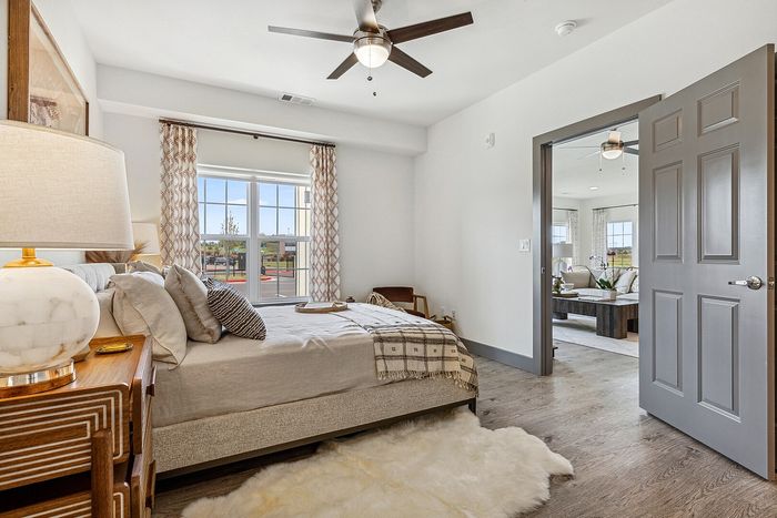 Model Main Bedroom at The Laurels Apartments in Jenks, OK