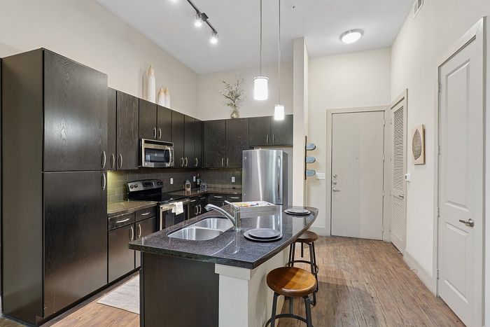 Kitchen at The District at Washington Apartments in Houston, TExas