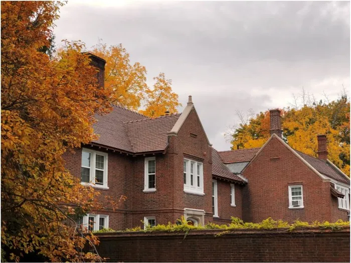 Exterior View of apartments, grounds, fall foliage at Colonial Village Apartments in Manchester, NH