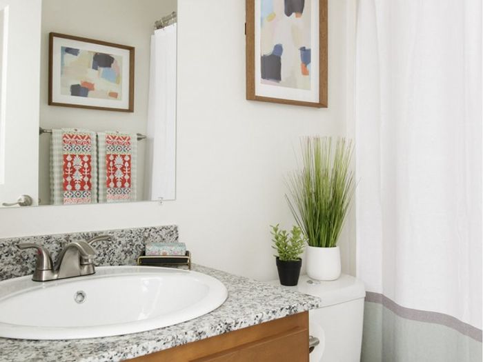 Bathroom with an elegant oval sink at The Flatts Salisbury