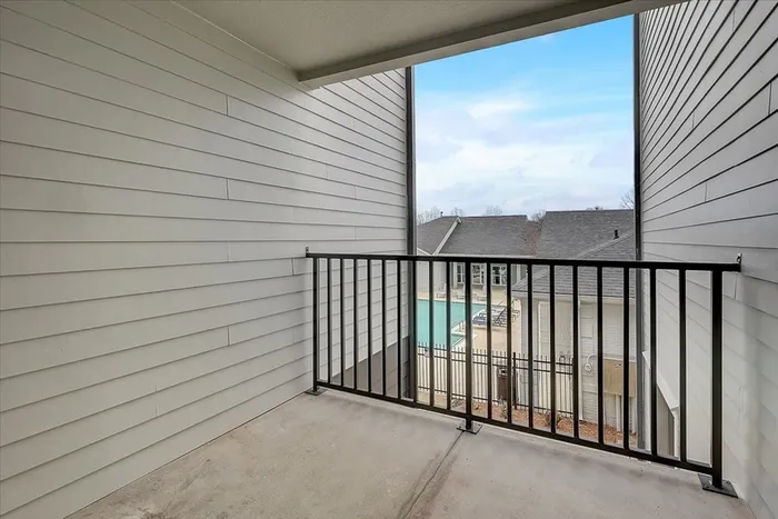 Private balcony with a view of the pool at The Preserve Murfreesboro.