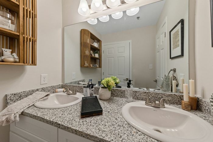 Beautiful bathroom with double vanity and granite counters