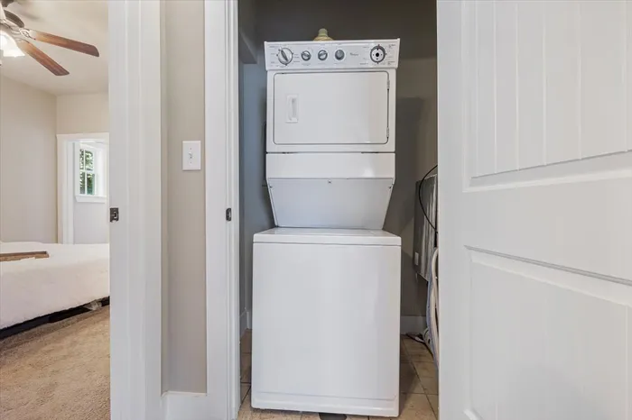 Convenient in-unit washer and dryer setup in The Cottages of Hattiesburg, offering students a private laundry space for added comfort and ease.