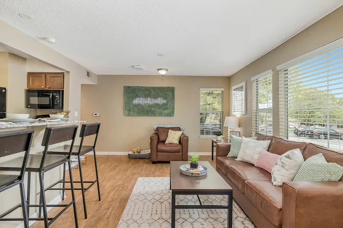 Elegant wood-style flooring in common areas of apartments