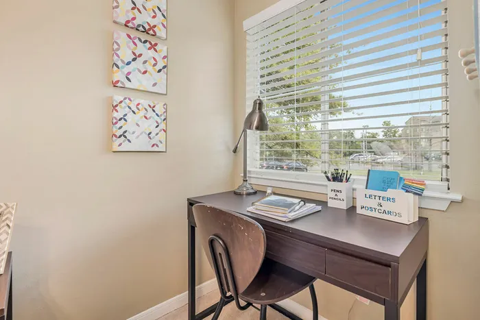 Large bedroom with a desk study area