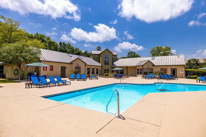 Spacious sun deck by the pool for residents