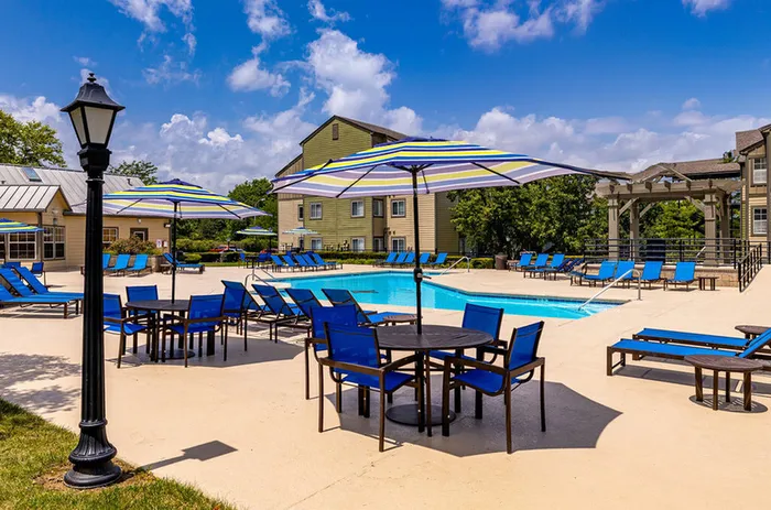 Refreshing pool surrounded by lounge seating