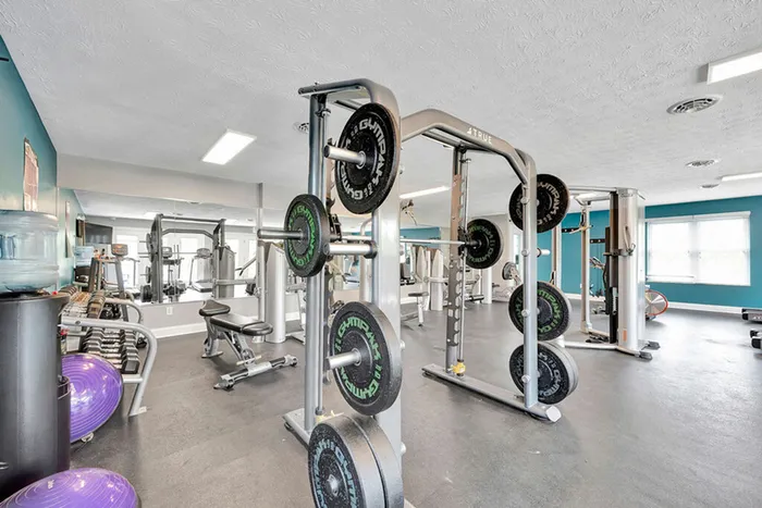 Resident fitness center with workout machines at The Commons student apartments in Oxford, OH