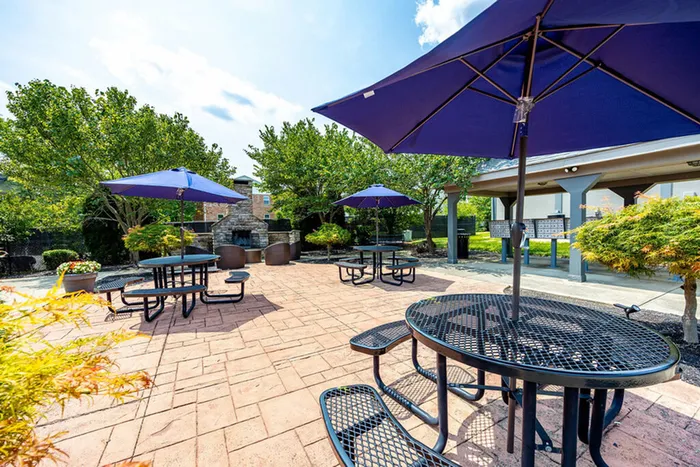 Outdoor picnic area at The Commons student apartments in Oxford, OH