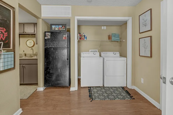 Full-size washer and dryer in every apartment at Raiders Walk, providing convenient in-unit laundry facilities for residents