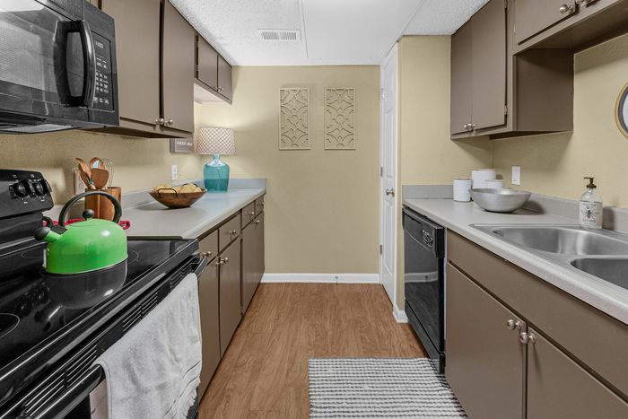 Galley style kitchen with plenty of storage
