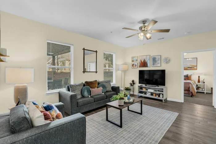 Cozy living room in a student apartment at The Flatts Starkville.