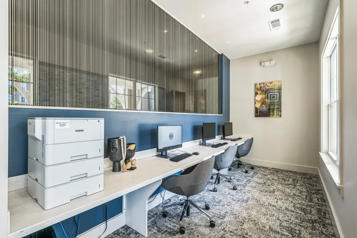 Business center with computers and a printing station