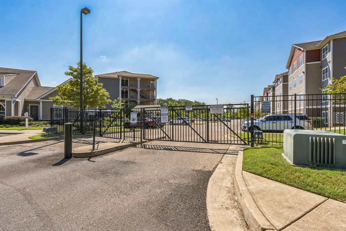 Gate with controlled access to parking lot at The Flatts Starkville