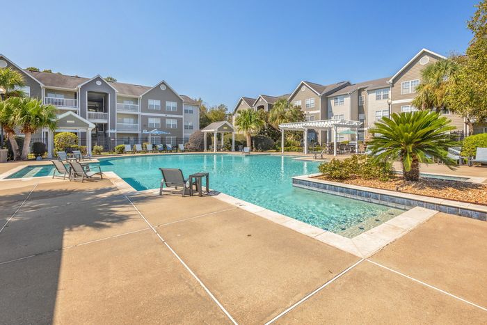 Pool and sun deck at Theater Street Apartments in Lafayette, LA