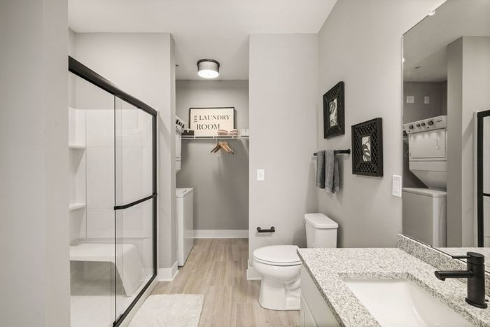 Iron Works Model Bathroom and Closet with In-Unit Laundry
