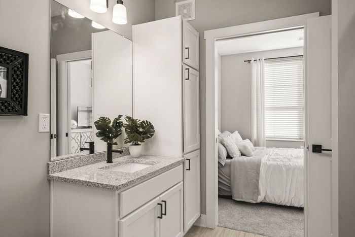 Iron Works Model Bathroom and Closet with In-Unit Laundry