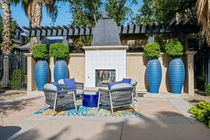 Firepit with surrounding seating - Lunaire Apartments | Goodyear, Arizona