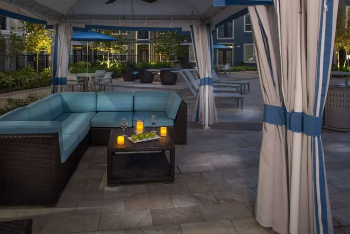 Outdoor Lounge with Comfortable Seating at Greenhouse Apartments Houston, TX