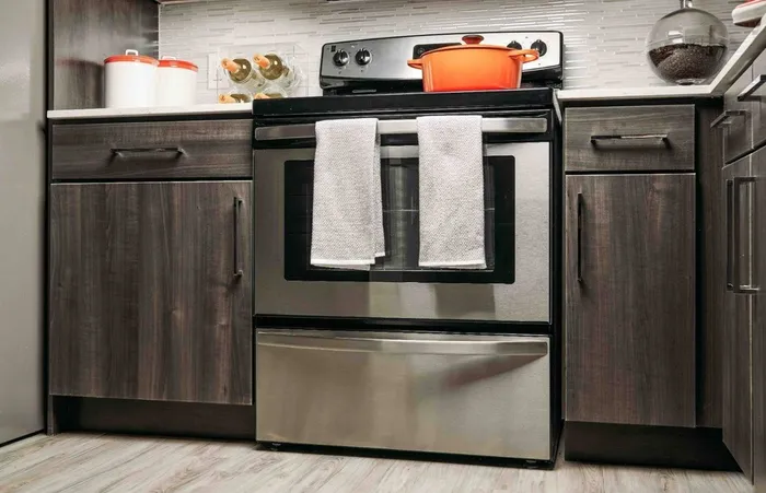 Stainless Steel Stove in Cozy Dining Area at Greenhouse; Apartments Houston, TX