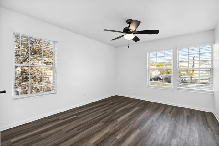 Renovated Apartment - Wood-plank flooring, sliding doors, ceiling fan in bed room at  | The Residence at Turnberry | Columbus Apartments