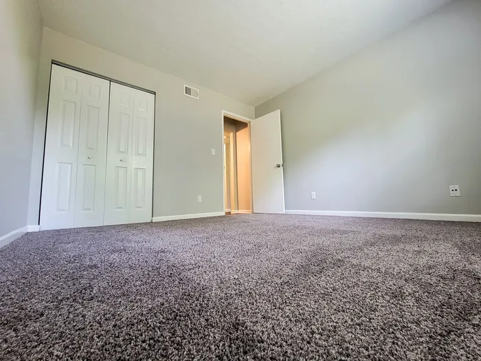 Spacious Bedroom at Tanglewood Apartments; Apartments in Louisville - Edgewood