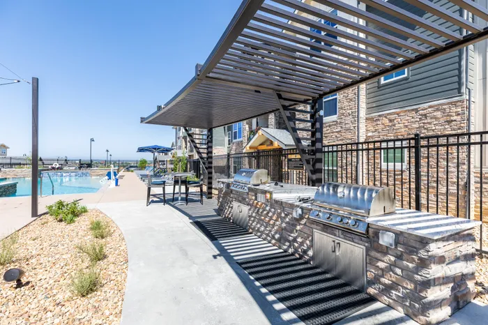 Poolside Grilling Station | Peakline at Copperleaf | Aurora Apartments