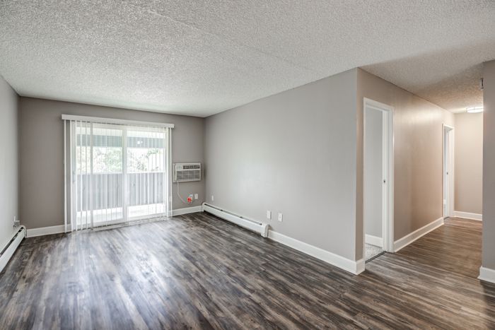 Florida Station | Aurora, CO | Living Room w/ Luxury Flooring