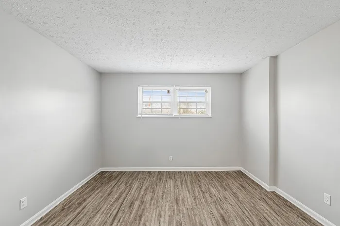 Skyview Commons | Jeffersontown, KY | Bedroom w/ Hardwood Style Flooring
