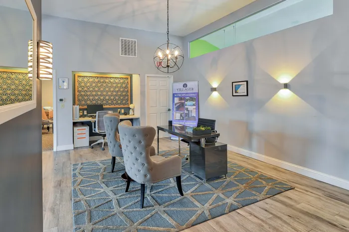 Sophisticated office space with elegant seating, modern lighting, and stylish decor accents.