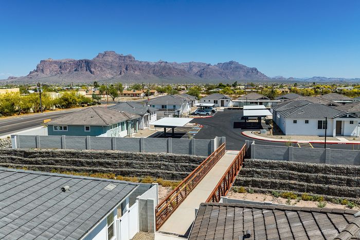 Charming suburban neighborhood with a breathtaking mountain backdrop, featuring modern homes and well-maintained streets.