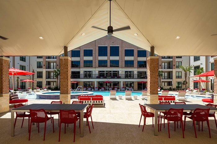 Poolside cabana with grills