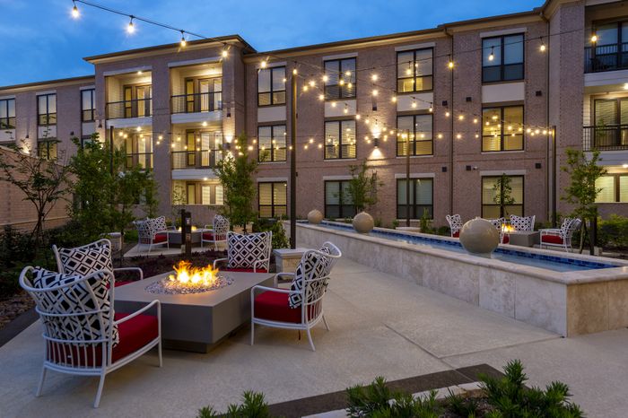 Relaxation Courtyard with Fire Tables and Relaxing Water Feature