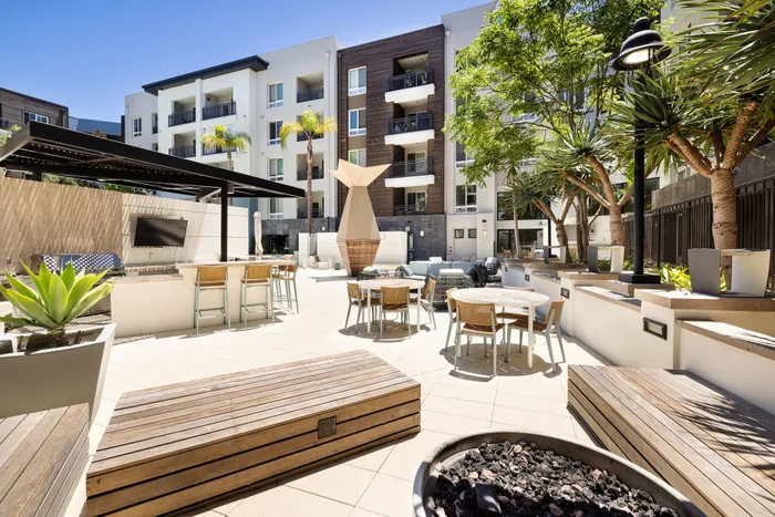 Outdoor Seating Area and Pool Deck | Elan Huntington Beach | Apartments in Huntington Beach, CA