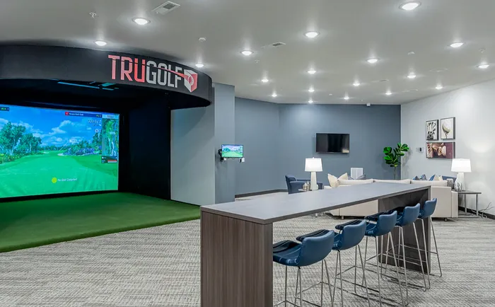 Resident game room with Golf Simulator