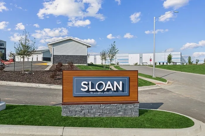 Main entrance with monument sign