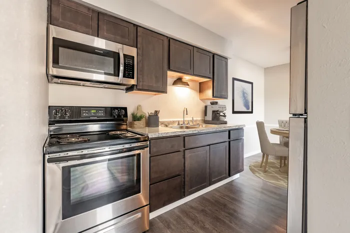 Toledo Ohio, Two Bedroom Premium Apartment, Carpeted Floors, Neutral Paint Schemes, Granite Style Counters, Hardwood Style Floors, Shaker Style Cabinets, Matching Appliances, Spacious Closets