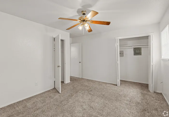 Bedroom with two closets at Fox Trail Apartments