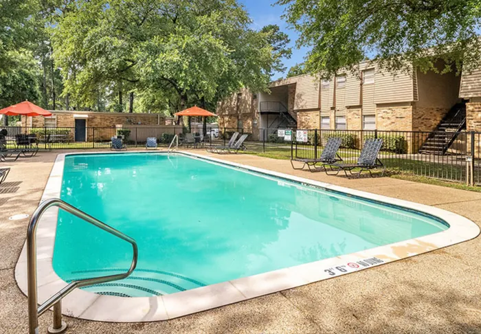 Pool with patio furniture